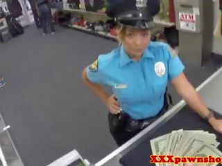 Latina cop posing for enchanting pics in uniform