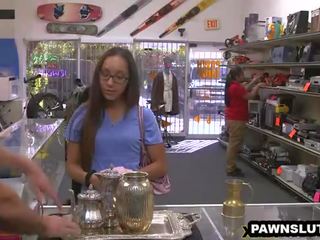 Geeky brunette diva trying to get a deal at the pawn shop