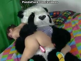 Sedusive brunette mademoiselle seducing Panda bear